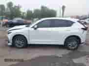 2024 Mazda CX-5 S Preferred z VIN JM3KFBCL4R0528914, wystawiony jako IAAI lot #43400189 z przebiegiem 7 680 mil mil oraz . Historia ofert i sprzedaży dostępna na DreamBid. Obrazek 14.