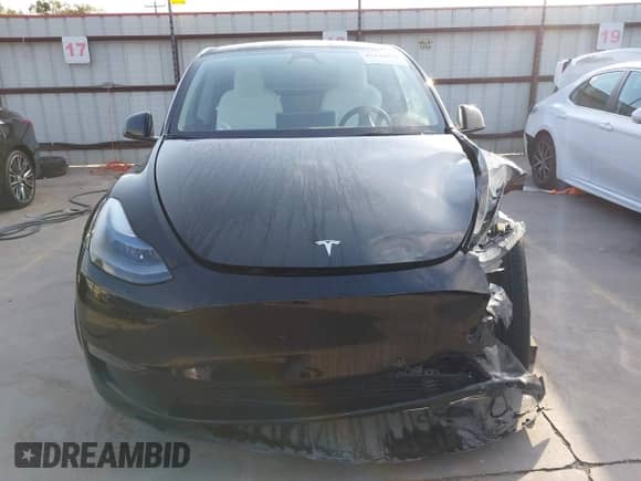 2023 Tesla Model Y Long Range z VIN 7SAYGAEE7PF767951, wystawiony jako IAAI lot #43128878 z przebiegiem 36 431 mil mil oraz . Historia ofert i sprzedaży dostępna na DreamBid. Obrazek 19.