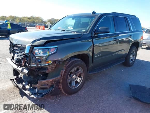 2019 Chevrolet Tahoe LS with VIN 1GNSKAKC4KR226743, listed as a IAAI auction lot 40839068 with 104,220 mi miles and . Bid and sale history available at DreamBid. Image 2.