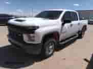 2020 Chevrolet Silverado 2500HD Work Truck z VIN 1GC1YLE74LF196238, wystawiony jako IAAI lot #42032508 z przebiegiem 128 921 mil mil oraz . Historia ofert i sprzedaży dostępna na DreamBid. Obrazek 2.