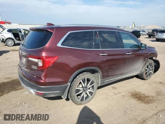 2020 Honda Pilot Elite с VIN 5FNYF6H02LB038814, выставлен на аукционе Copart как лот 81587065 с пробегом 125 151 миль миль и Списание • Salvage title. История ставок и продаж доступна на DreamBid. Изображение 3.