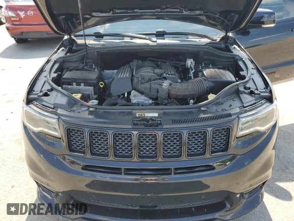 2019 Jeep Grand Cherokee SRT with VIN 1C4RJFDJ0KC629446, listed as a Copart auction lot 66654775 with 65,663 mi miles and Salvage title. Bid and sale history available at DreamBid. Image 12.