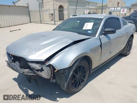 2012 Ford Mustang Premium with VIN 1ZVBP8AM3C5208320, listed as a IAAI auction lot 42941201 with 99,612 mi miles and . Bid and sale history available at DreamBid. Image 2.