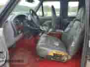 1994 Ford F-150 с VIN 1FTEX15N6RKC00717, выставлен на аукционе Copart как лот 56035505 с пробегом 216 633 миль миль и Чистый • Clean title. История ставок и продаж доступна на DreamBid. Изображение 7.