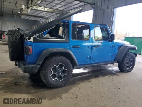 2023 Jeep Wrangler Rubicon with VIN 1C4HJXFN7PW693166, listed as a Copart auction lot 84430324 with 40,093 mi miles and Salvage title. Bid and sale history available at DreamBid. Image 3.
