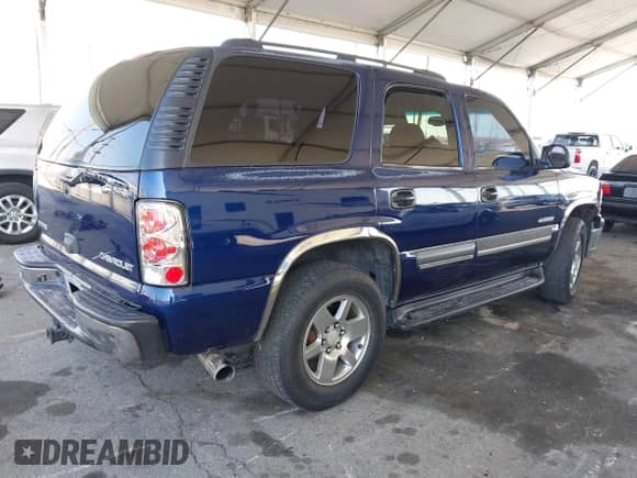 2003 Chevrolet Tahoe LS z VIN 1GNEC13T03J180708, wystawiony jako IAAI lot #41543671 z przebiegiem 203 442 mil mil oraz . Historia ofert i sprzedaży dostępna na DreamBid. Obrazek 4.