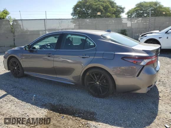 2023 Toyota Camry Hybrid XSE с VIN 4T1K31AK2PU601303, выставлен на аукционе Copart как лот 81736455 с пробегом 23 901 миль миль и Списание • Salvage title. История ставок и продаж доступна на DreamBid. Изображение 2.