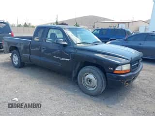 2000 Dodge Dakota with VIN 1B7GL22X0YS776124, listed as a IAAI auction lot 42630499 with 241,378 mi miles and . Bid and sale history available at DreamBid. Image 1.