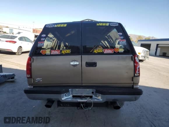 1994 Chevrolet Suburban with VIN 1GNEC16K0RJ411599, listed as a Copart auction lot 73436004 with 273,785 mi miles and Salvage title. Bid and sale history available at DreamBid. Image 6.