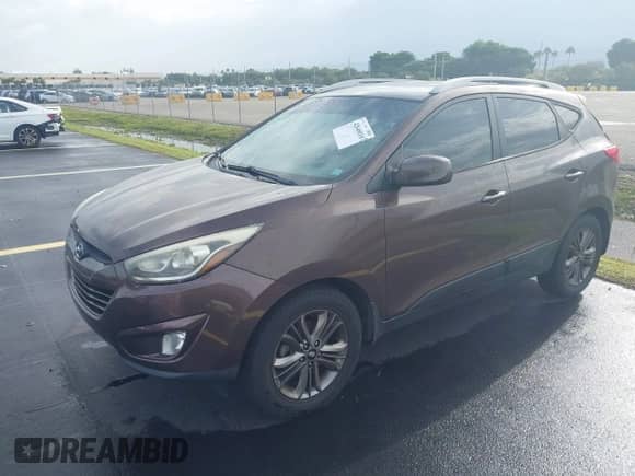2014 Hyundai Tucson Limited with VIN KM8JU3AGXEU833578, listed as a IAAI auction lot 42646016 with 122,387 mi miles and . Bid and sale history available at DreamBid. Image 2.