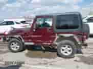 2001 Jeep Wrangler SE with VIN 1J4FA29P21P300094, listed as a IAAI auction lot 41871446 with 125,098 mi miles and . Bid and sale history available at DreamBid. Image 14.