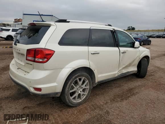 2014 Dodge Journey Limited with VIN 3C4PDDDG5ET166865, listed as a Copart auction lot 67086805 with 136,283 mi miles and Salvage title. Bid and sale history available at DreamBid. Image 3.