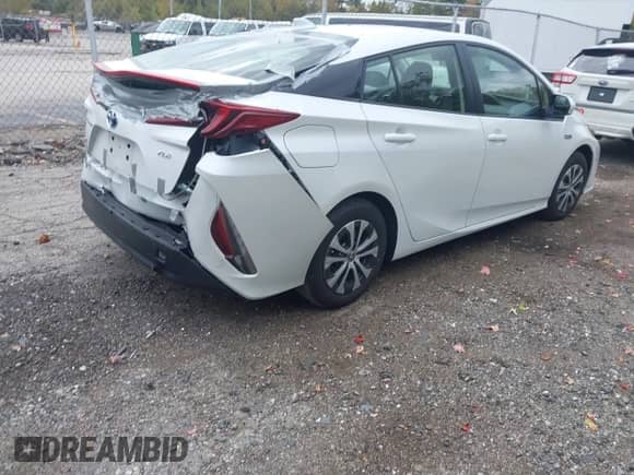 2022 Toyota Prius XLE with VIN JTDKAMFP9N3220440, listed as a IAAI auction lot 43428027 with 34,374 mi miles and . Bid and sale history available at DreamBid. Image 4.