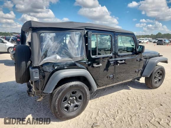 2023 Jeep Wrangler Sport с VIN 1C4HJXDN5PW635141, выставлен на аукционе Copart как лот 84773295 с пробегом 52 735 миль миль и Списание • Salvage title. История ставок и продаж доступна на DreamBid. Изображение 3.