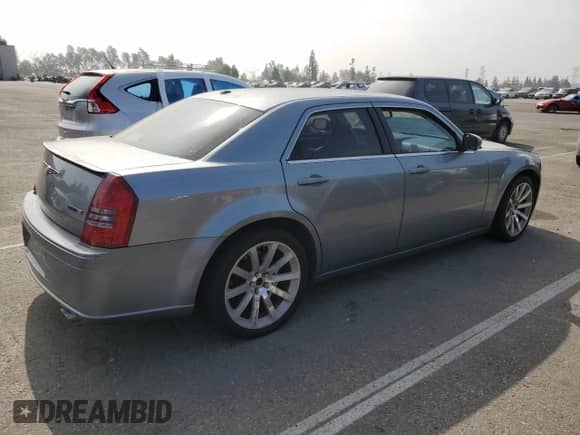 2006 Chrysler 300 C SRT-8 с VIN 2C3LA73W76H508574, выставлен на аукционе Copart как лот 69081025 с пробегом 196 734 миль миль и Чистый • Clean title. История ставок и продаж доступна на DreamBid. Изображение 3.