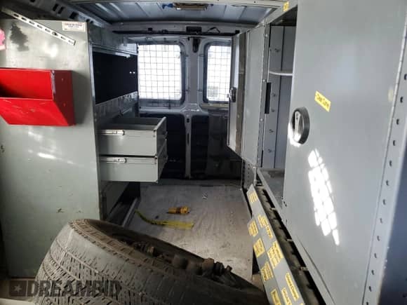2009 Chevrolet Express Cargo с VIN 1GCFG15X491110333, выставлен на аукционе Copart как лот 88082765 с пробегом 77 188 миль миль и Списание • Salvage title. История ставок и продаж доступна на DreamBid. Изображение 10.