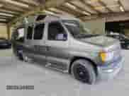 2002 Ford Econoline Cargo Recreational with VIN 1FDRE14L42HB76262, listed as a Copart auction lot 66448265 with 99,825 mi miles and Salvage title. Bid and sale history available at DreamBid. Image 4.