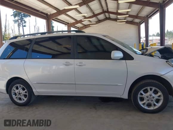 2004 Toyota Sienna XLE z VIN 5TDZA22C94S054651, wystawiony jako IAAI lot #42943588 z przebiegiem 242 458 mil mil oraz . Historia ofert i sprzedaży dostępna na DreamBid. Obrazek 13.