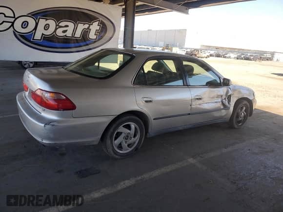 1999 Honda Accord LX z VIN JHMCG6654XC023089, wystawiony jako Copart lot #69421625 z przebiegiem 259 495 mil mil oraz Szkoda całkowita • Salvage title. Historia ofert i sprzedaży dostępna na DreamBid. Obrazek 3.