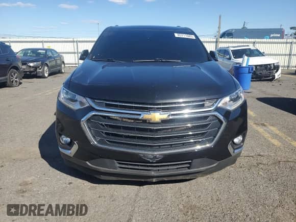2020 Chevrolet Traverse LT Cloth с VIN 1GNEVGKWXLJ113882, выставлен на аукционе Copart как лот 85711085 с пробегом 145 479 миль миль и Списание • Salvage title. История ставок и продаж доступна на DreamBid. Изображение 5.