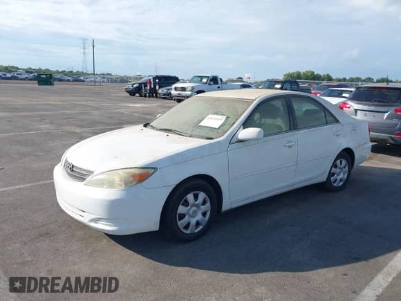 2004 Toyota Camry LE with VIN 4T1BE32K14U324837, listed as a IAAI auction lot 43132115 with 180,230 mi miles and . Bid and sale history available at DreamBid. Image 2.