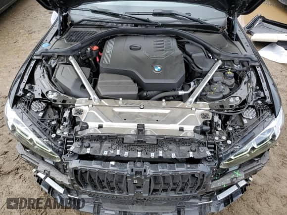 2022 BMW 4 Series 430i with VIN WBA23AT03NCJ32884, listed as a Copart auction lot 48077065 with 12,910 mi miles and Salvage title. Bid and sale history available at DreamBid. Image 11.