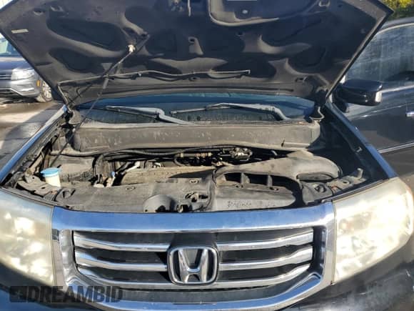 2012 Honda Pilot Touring with VIN 5FNYF4H9XCB055945, listed as a Copart auction lot 84244365 with 168,861 mi miles and Salvage title. Bid and sale history available at DreamBid. Image 12.