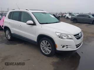 2011 Volkswagen Tiguan SE with VIN WVGAV7AX9BW534166, listed as a IAAI auction lot 41146905 with 118,095 mi miles and . Bid and sale history available at DreamBid. Image 1.