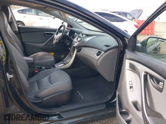 2013 Hyundai Elantra Limited z VIN 5NPDH4AE1DH211700, wystawiony jako IAAI lot #43300466 z przebiegiem 77 375 mil mil oraz . Historia ofert i sprzedaży dostępna na DreamBid. Obrazek 5.