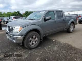 2009 Nissan Frontier SE with VIN 1N6AD09W89C425913, listed as a Copart auction lot 63806885 with 138,821 mi miles and Salvage title. Bid and sale history available at DreamBid. Image 1.