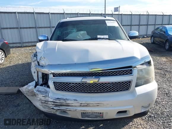 2010 Chevrolet Suburban LTZ z VIN 1GNUCKE00AR176516, wystawiony jako IAAI lot #42326903 z przebiegiem 189 777 mil mil oraz . Historia ofert i sprzedaży dostępna na DreamBid. Obrazek 13.