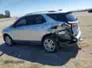 2018 Chevrolet Equinox Premier с VIN 2GNAXWEXXJ6330141, выставлен на аукционе Copart как лот 71128485 с пробегом 91 725 миль миль и Списание • Salvage title. История ставок и продаж доступна на DreamBid. Изображение 2.