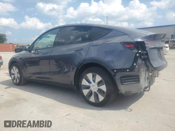 2023 Tesla Model Y with VIN 7SAYGDED6PF960648, listed as a Copart auction lot 67447254 with 18,536 mi miles and Salvage title. Bid and sale history available at DreamBid. Image 2.