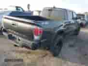 2021 Toyota Tacoma SR5 z VIN 3TMDZ5BN2MM108586, wystawiony jako IAAI lot #41604953 z przebiegiem 65 422 mil mil oraz . Historia ofert i sprzedaży dostępna na DreamBid. Obrazek 4.
