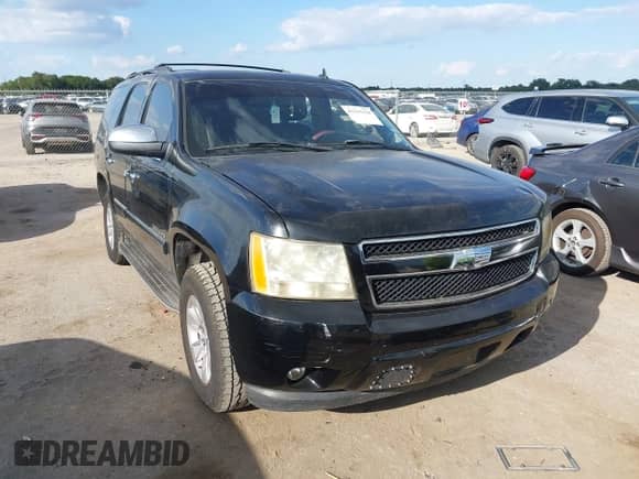 2007 Chevrolet Tahoe LT z VIN 1GNFC13047R406069, wystawiony jako IAAI lot #43315118 z przebiegiem 196 957 mil mil oraz . Historia ofert i sprzedaży dostępna na DreamBid. Obrazek 1.