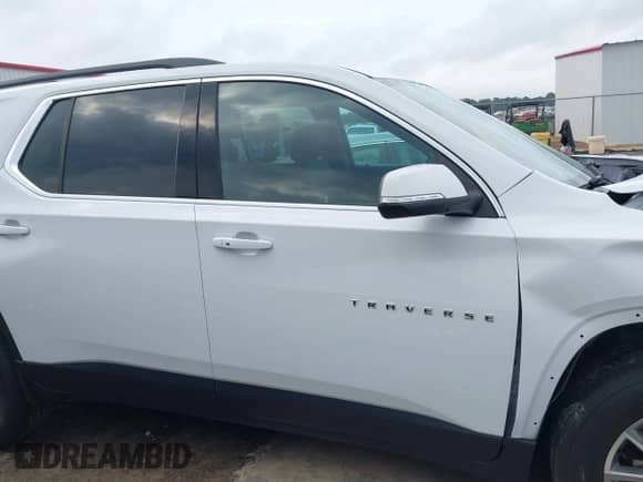 2023 Chevrolet Traverse LT Cloth z VIN 1GNERGKW3PJ209041, wystawiony jako IAAI lot #42796370 z przebiegiem 36 805 mil mil oraz . Historia ofert i sprzedaży dostępna na DreamBid. Obrazek 13.