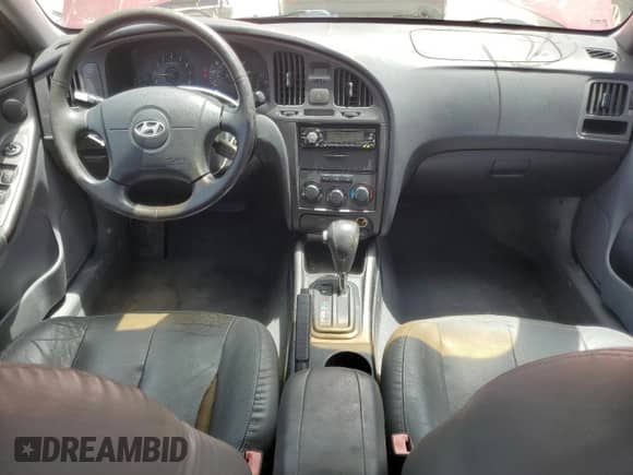 2004 Hyundai Elantra GT z VIN KMHDN56DX4U121512, wystawiony jako Copart lot #65407965 z przebiegiem 70 744 mil mil oraz Szkoda całkowita • Salvage title. Historia ofert i sprzedaży dostępna na DreamBid. Obrazek 8.