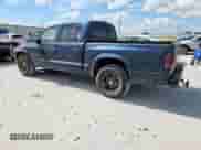 2002 Dodge Dakota Sport z VIN 1B7HL38N62S692851, wystawiony jako Copart lot #63767335 z przebiegiem 218 871 mil mil oraz Szkoda całkowita • Salvage title. Historia ofert i sprzedaży dostępna na DreamBid. Obrazek 2.