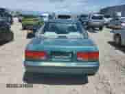 1993 Honda Accord LX с VIN 1HGCB7552PA127679, выставлен на аукционе Copart как лот 55845345 с пробегом 293 718 миль миль и Списание • Salvage title. История ставок и продаж доступна на DreamBid. Изображение 6.