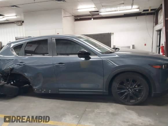 2023 Mazda CX-5 S Preferred z VIN JM3KFBCM3P0282220, wystawiony jako IAAI lot #43188220 z przebiegiem 29 080 mil mil oraz . Historia ofert i sprzedaży dostępna na DreamBid. Obrazek 13.