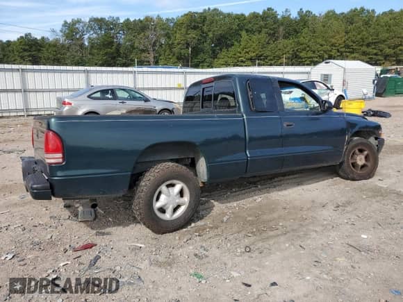 1998 Dodge Dakota SLT with VIN 1B7GL22X1WS693976, listed as a Copart auction lot 80073765 with 142,655 mi miles and Salvage title. Bid and sale history available at DreamBid. Image 3.