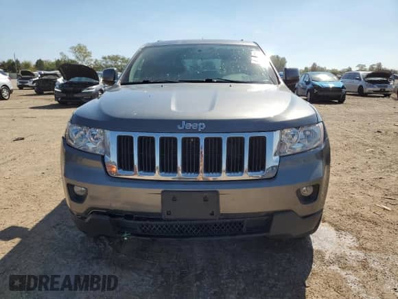 2012 Jeep Grand Cherokee Laredo with VIN 1C4RJFAG2CC135566, listed as a Copart auction lot 80711755 with 163,412 mi miles and Salvage title. Bid and sale history available at DreamBid. Image 5.