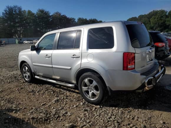 2015 Honda Pilot EX z VIN 5FNYF4H49FB050986, wystawiony jako Copart lot #70577545 z przebiegiem 102 025 mil mil oraz Szkoda całkowita • Salvage title. Historia ofert i sprzedaży dostępna na DreamBid. Obrazek 2.