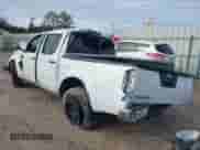 2017 Nissan Frontier SV with VIN 1N6DD0EV2HN765247, listed as a IAAI auction lot 41017764 with 141,942 mi miles and . Bid and sale history available at DreamBid. Image 3.