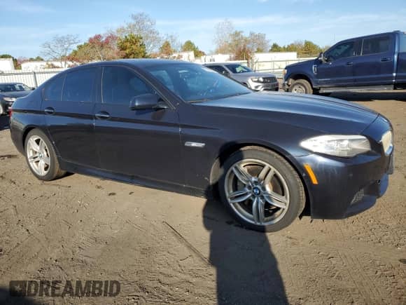 2013 BMW 5 Series 550i xDrive with VIN WBAFU9C53DDY72145, listed as a Copart auction lot 77550544 with 90,439 mi miles and Clean title. Bid and sale history available at DreamBid. Image 4.