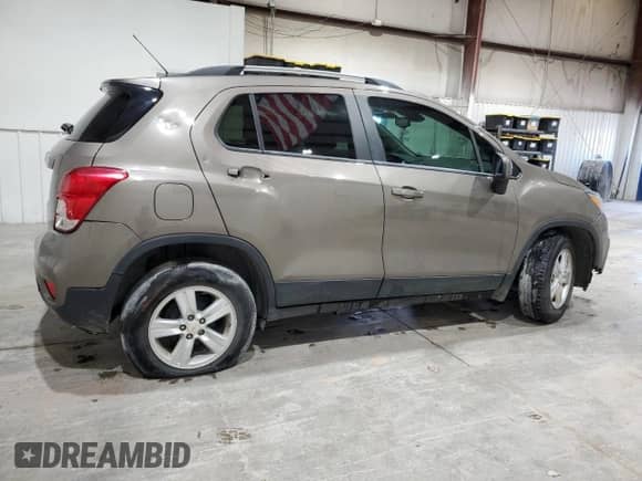 2021 Chevrolet Trax LT с VIN KL7CJLSB0MB309369, выставлен на аукционе Copart как лот 52088635 с пробегом 175 258 миль миль и Чистый • Clean title. История ставок и продаж доступна на DreamBid. Изображение 3.