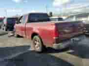 2003 Ford F-150 XL with VIN 1FTRX17W33NA89735, listed as a Copart auction lot 81902025 with 243,918 mi miles and Salvage title. Bid and sale history available at DreamBid. Image 2.