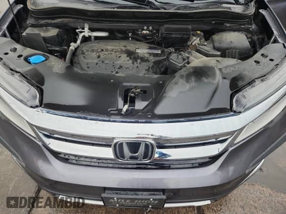 2020 Honda Pilot Touring 8-Passenger z VIN 5FNYF6H90LB046599, wystawiony jako Copart lot #85332205 z przebiegiem 58 170 mil mil oraz Szkoda całkowita • Salvage title. Historia ofert i sprzedaży dostępna na DreamBid. Obrazek 12.