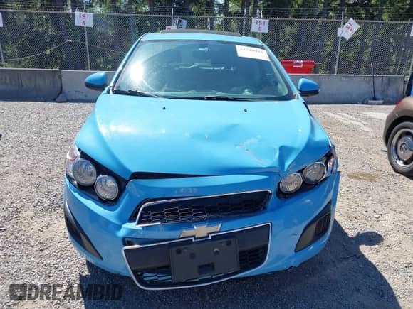 2014 Chevrolet Sonic LT with VIN 1G1JC6SBXE4157220, listed as a IAAI auction lot 42728931 with 76,007 mi miles and . Bid and sale history available at DreamBid. Image 12.