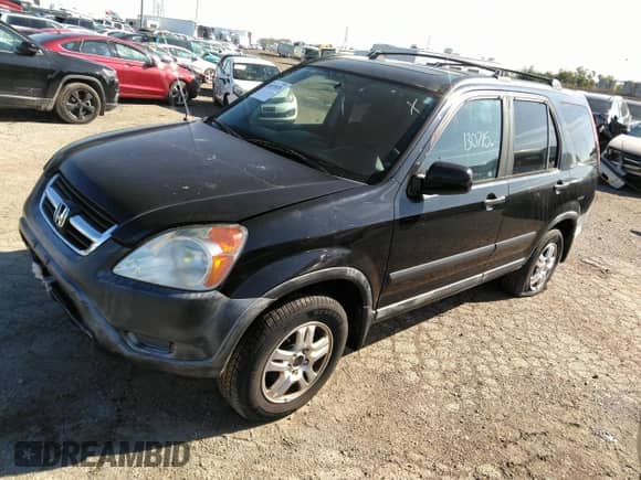 2002 Honda CR-V EX with VIN JHLRD78882C050468, listed as a IAAI auction lot 31653976 with 130,715 mi miles and . Bid and sale history available at DreamBid. Image 2.